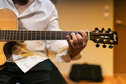 Master the Strings: 12 Essential Tips to Learn Guitar Songs Faster